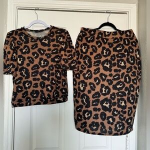 Brand lark and Grey size large, color brown and black animal print
